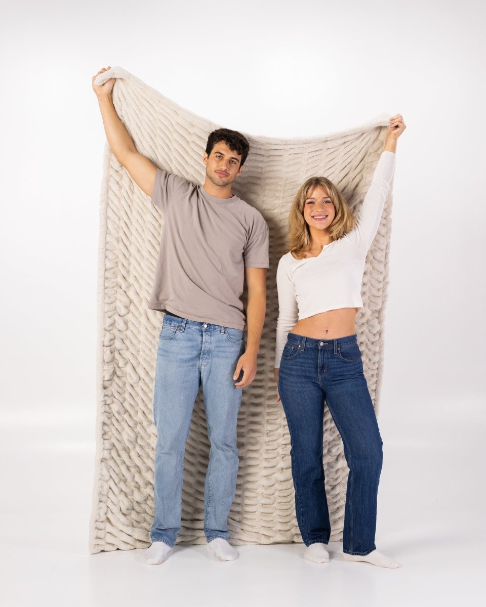 Dune Cream Cloud Throw ultra soft luxury faux fur weighted oversized blanket held by couple