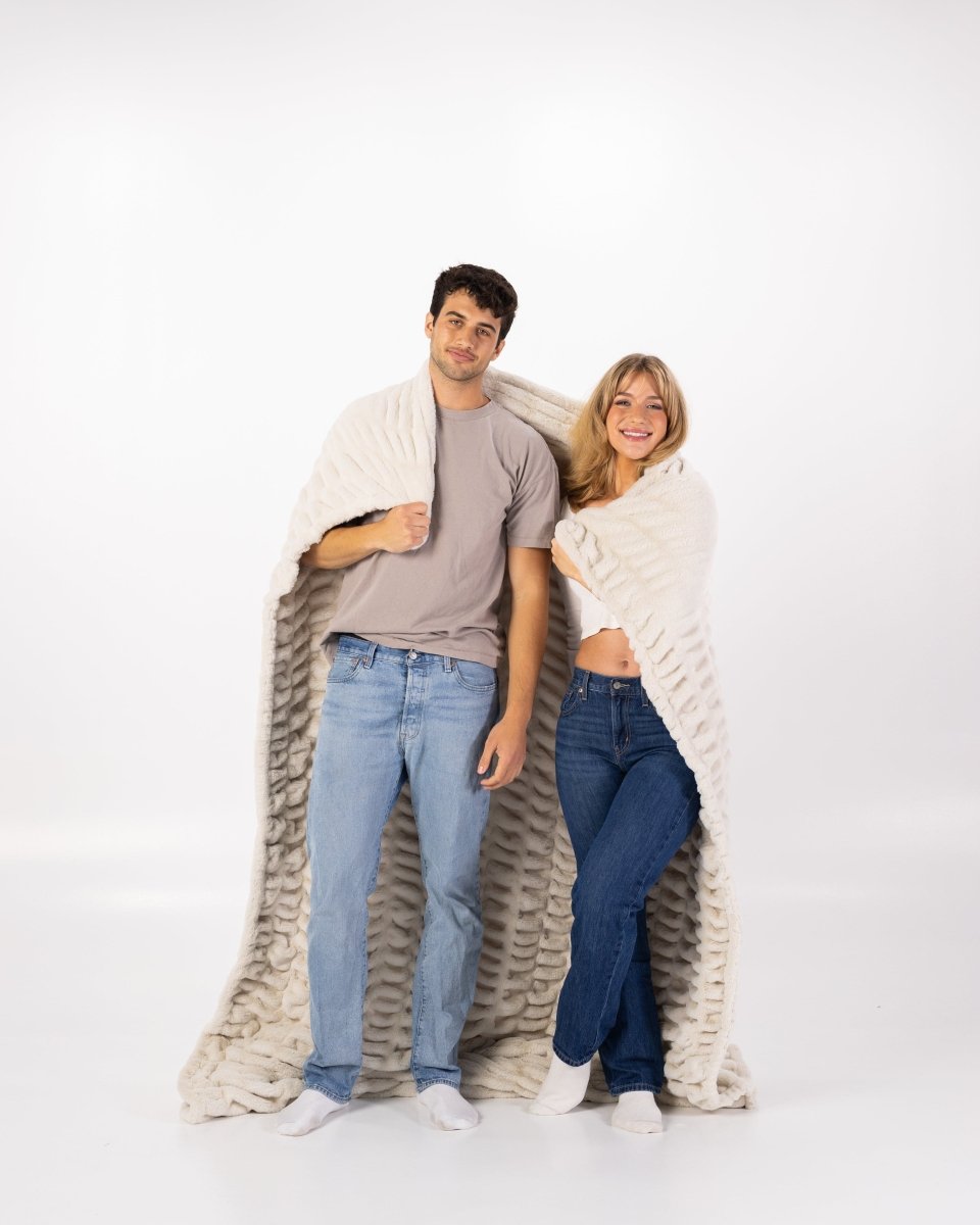 Dune Cream Cloud Throw ultra soft luxury faux fur weighted oversized blanket wrapped around couple