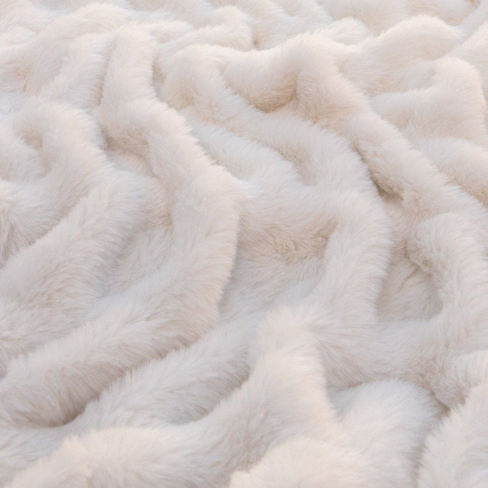 Dune Cream Cloud Throw ultra soft luxury faux fur weighted blanket up close.