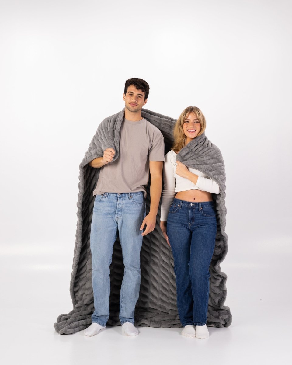 Graphite Gray Cloud Throw ultra soft luxury faux fur weighted oversized blanket wrapped around couple