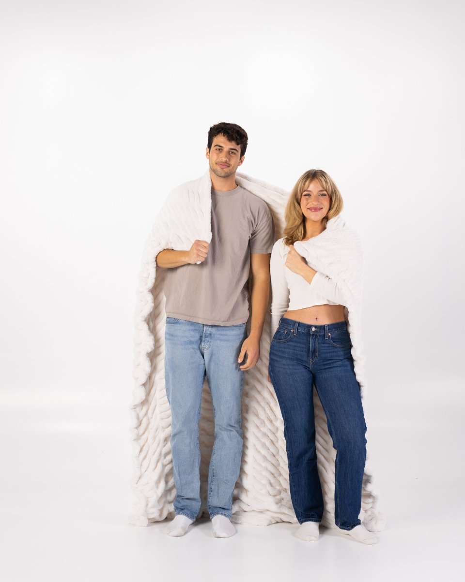 Ivory White Cloud Throw ultra soft luxury faux fur weighted oversized blanket wrapped around couple