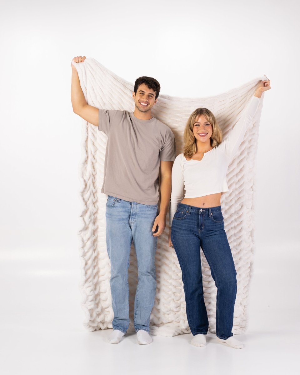 Ivory White Cloud Throw ultra soft luxury faux fur weighted oversized blanket held by couple