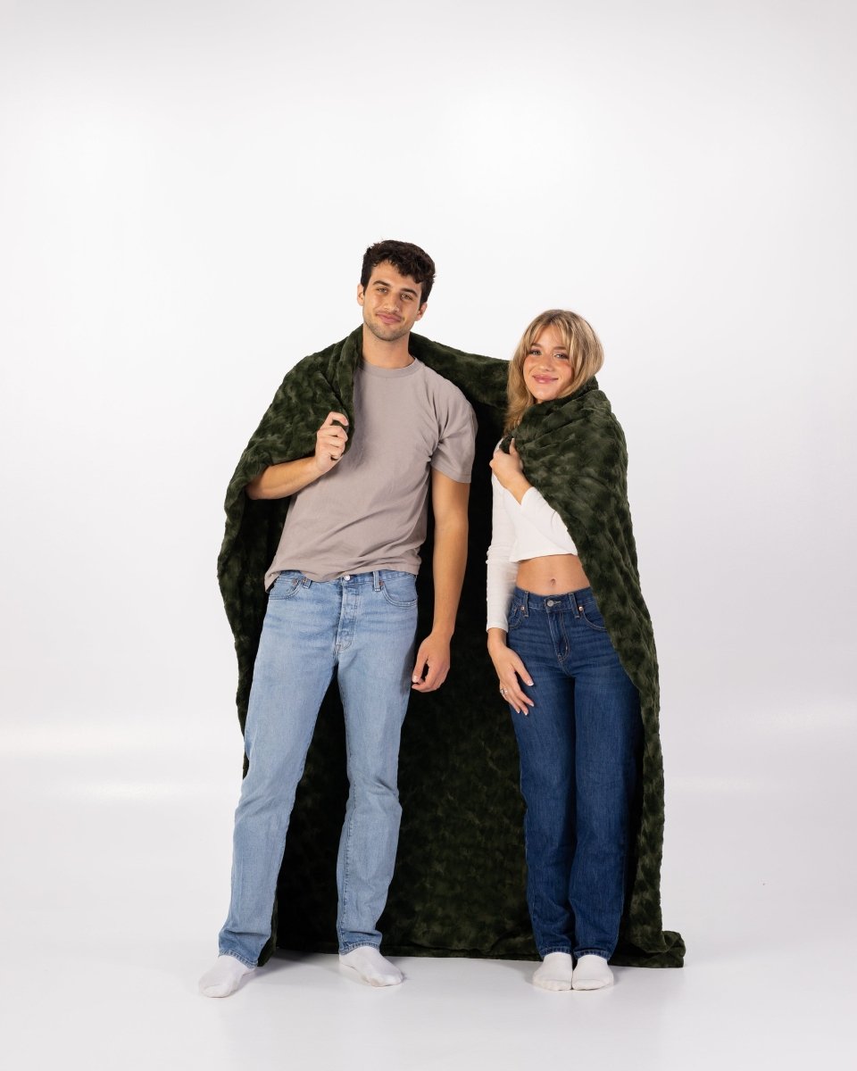 Loden Green Throw soft faux fur oversized wrapped around couple