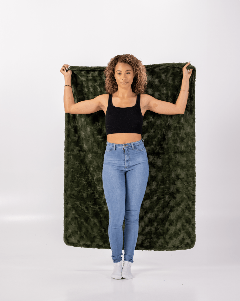 Loden Green Throw soft faux fur everyday blanket held by woman