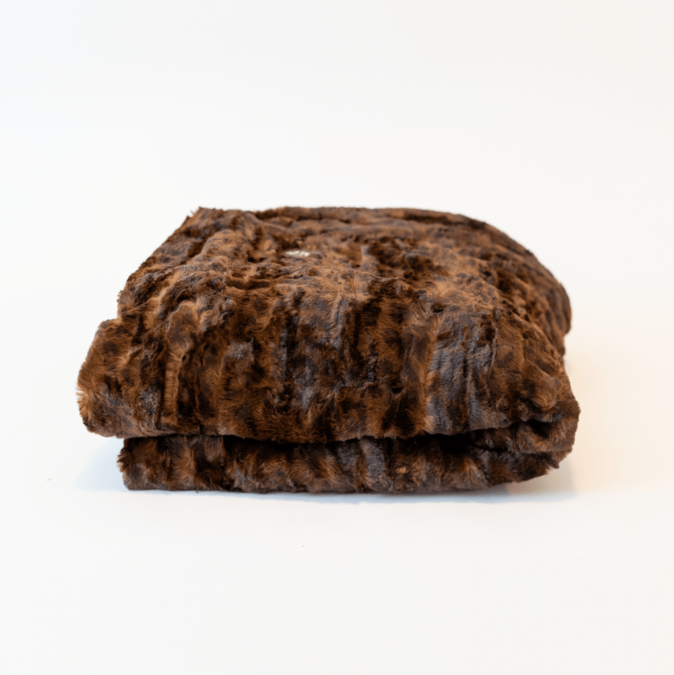 Mahogany Jaguar Cheetah Brown Throw Soft Blanket folded for couch and bed.