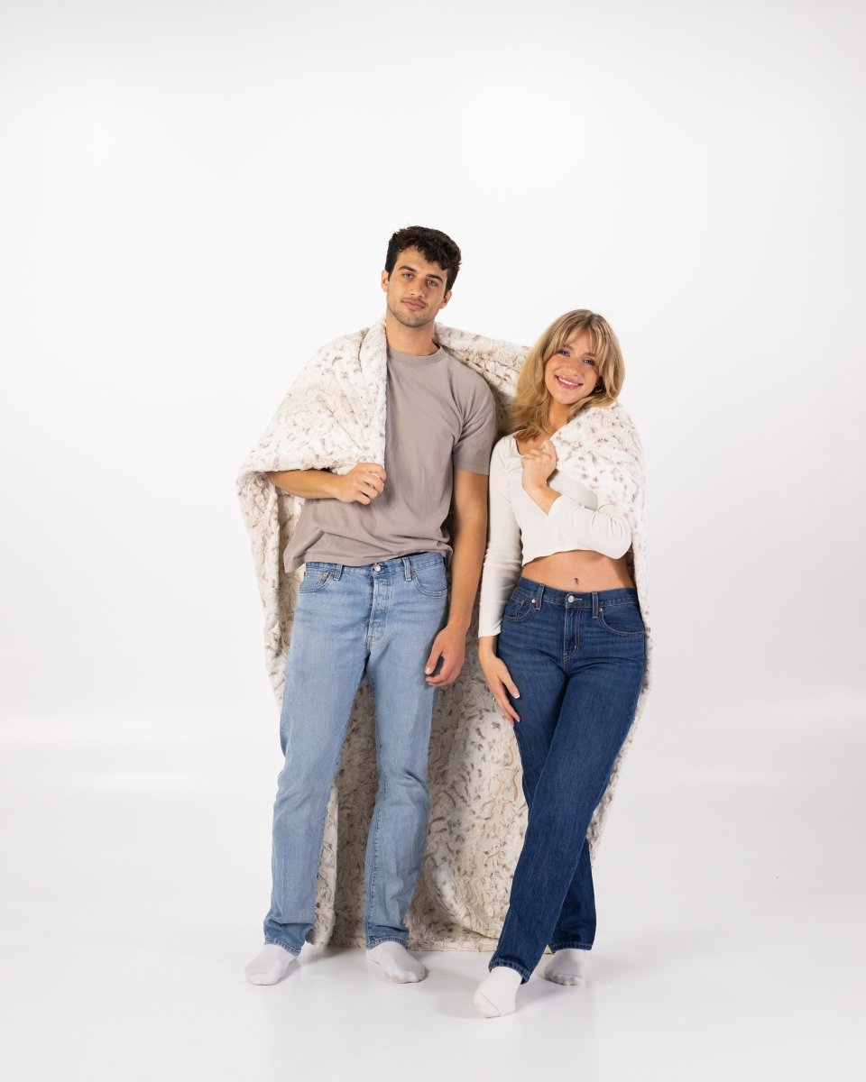Snowy Owl Cream Throw soft faux fur oversized blanket wrapped around couple