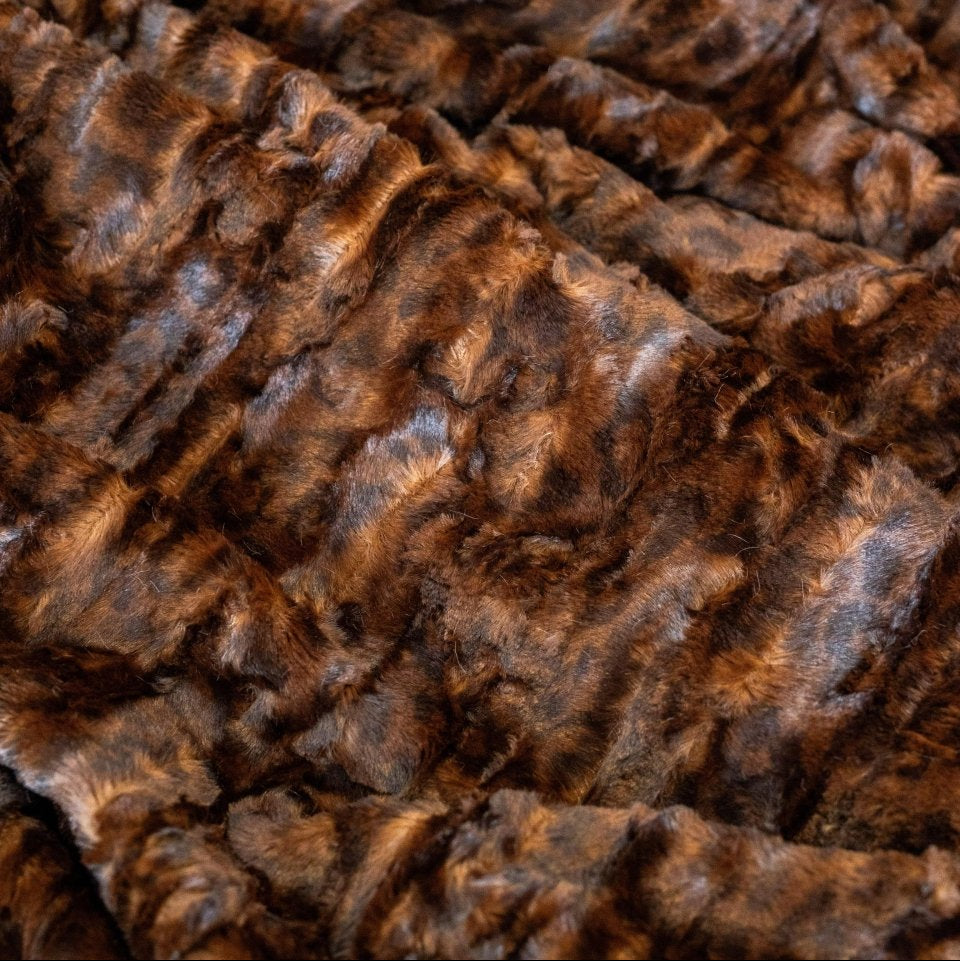 The Dream Set Mahogany Jaguar Cheetah travel bundle for gifting with faux fur blanket, eye mask and bag.