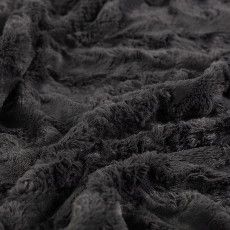 The Dream Set Black travel bundle for gifting with faux fur blanket, eye mask and bag.