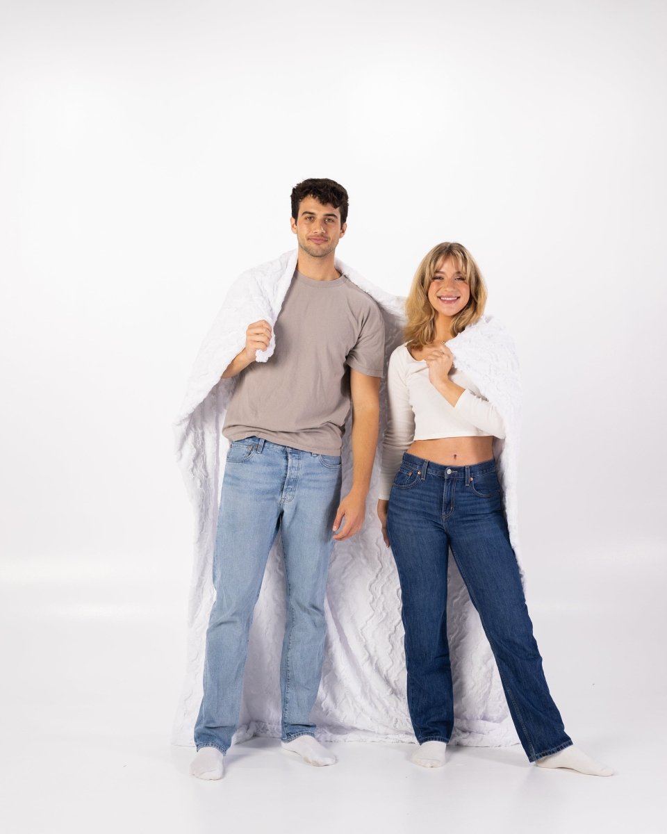 White Bella Throw soft faux fur oversized blanket wrapped around couple