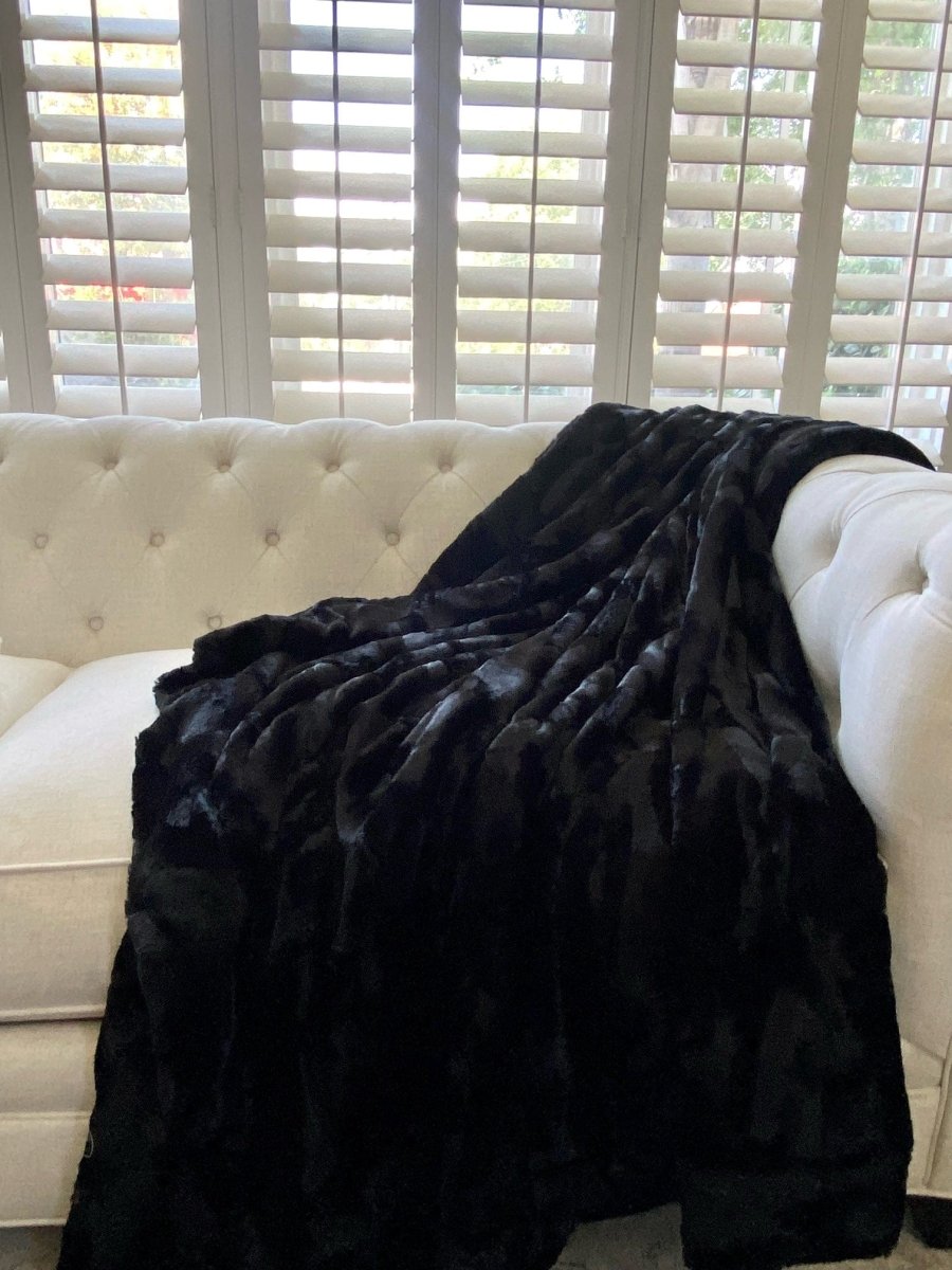 Black Bella Throw soft faux fur blanket draped living room couch home
