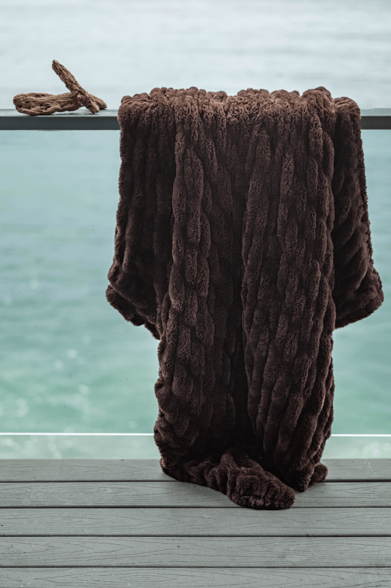 Espresso Brown Cloud Throw ultra soft luxury faux fur weighted blanket draped in beach house