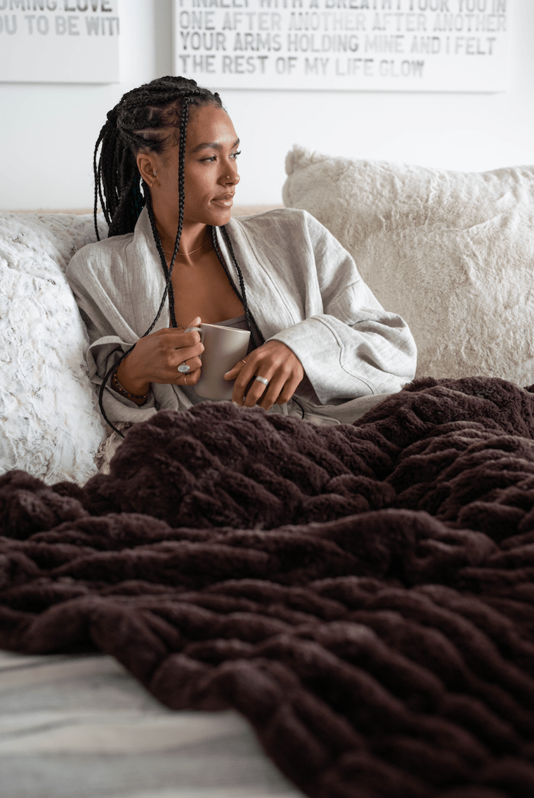 Espresso Brown Cloud Throw ultra soft luxury faux fur weighted blanket on living room couch