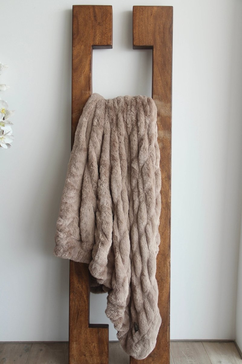 Mocha Brown Cloud Throw ultra soft luxury faux fur weighted blanket draped in living room