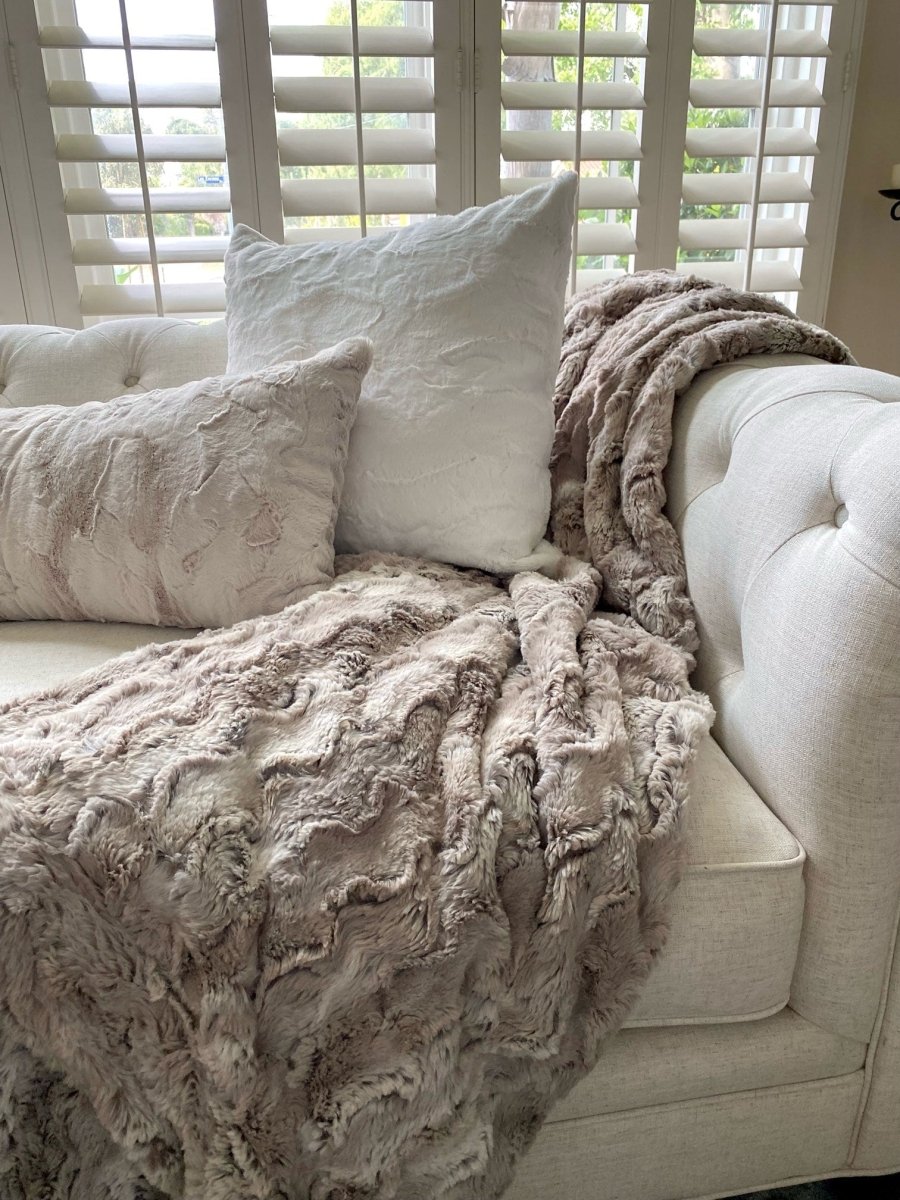 Sandshell Tan Brown Throw soft faux fur blanket draped living room couch home