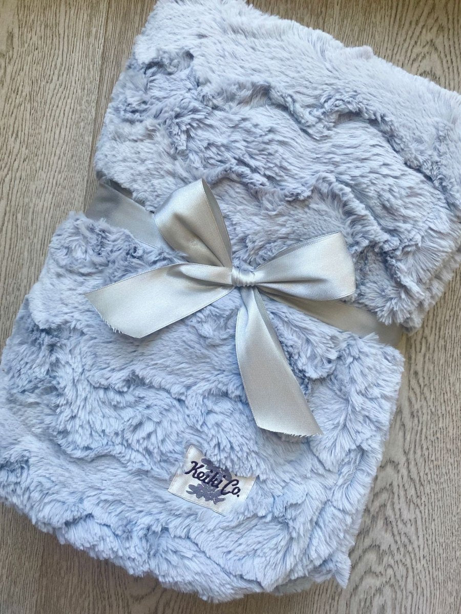 Silver Gray White Throw ready for gifting, gift wrapped with bow for holidays.